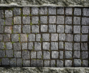 Granite cobblestoned pavement background