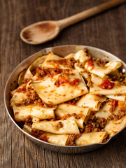 rustic italian pasta in ragu sauce