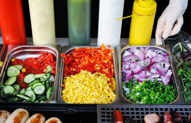 Tray with cooked food on showcase