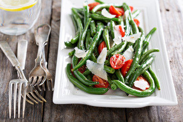 Warm salad with green beans and parmesan cheese