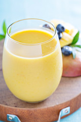 Mango smoothie on a board