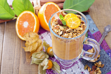 Pumpkin smoothie with granola on top