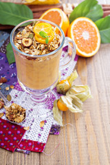 Pumpkin smoothie with granola on top