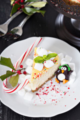 Piece of cheesecake decorated for Christmas