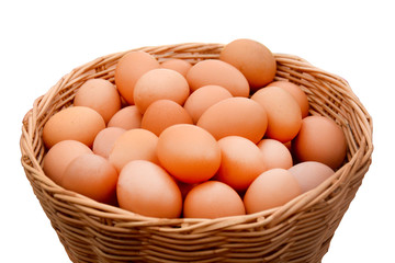 Egg collection in basket isolated on white background