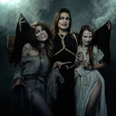 Halloween. The Middle Ages. Three witches.