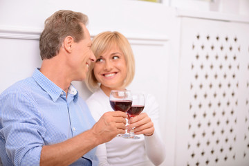 Adult couple drinking wine 