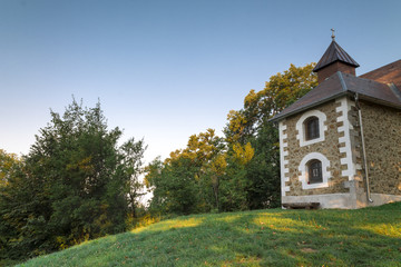 Naklejka premium Beautiful small church in the woods 