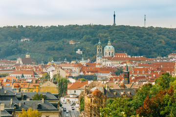 Fototapeta na wymiar Aerial view of cityscape and St. Nicholas Church in Prague, Czec