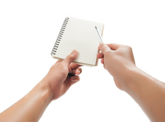 hand holding pen and notebook isolated over white background
