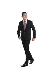 Asian business man walking