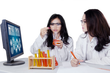 Researchers doing biotechnology experiment