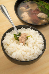 Close up Ma-Li rice with Minced pork by Pork soup made from pork bone and east herbs.