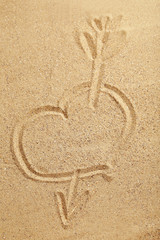 Heart handwritten on a beach sand