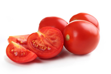 Fresh red tomatoes isolated on white