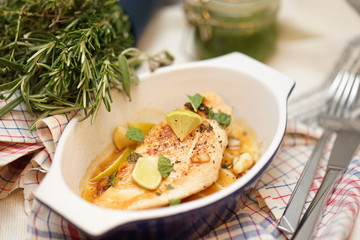 tasty  chicken  dish served in sauce with green garnier