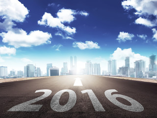 Year 2016 on the street with arrow