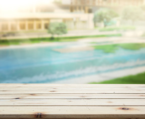Obraz na płótnie Canvas Wood Table Top Background And Pool
