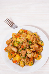 stewed meat with potatoes, onion and carrot