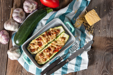 Fresh baked zucchini with meat and cheese.