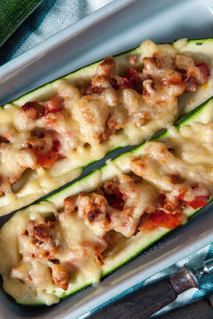 Fresh baked zucchini with meat and cheese.