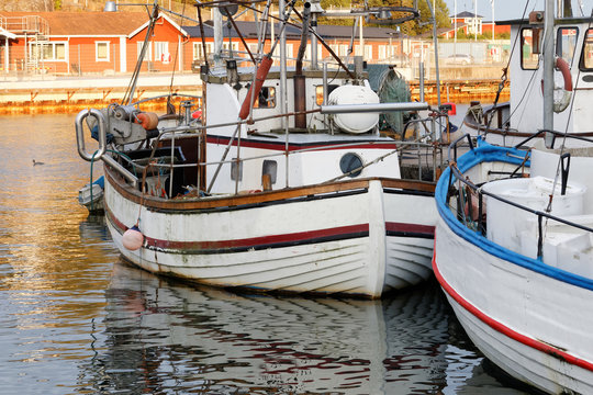 Fototapeta Small fishing boats in the harbor