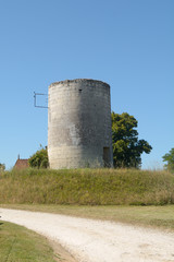 Fototapeta na wymiar Windmill with missing sails