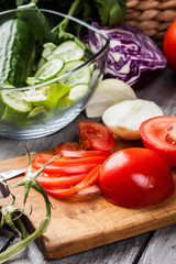 Chopped vegetables: tomatoes on cutting board