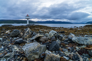 Fototapeta na wymiar Tromso county, Norway, landscape at the coast of the fjord