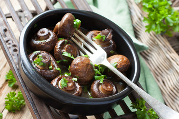 Baked champignons mushrooms