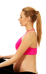 Fototapeta premium Pregnant woman relax doing yoga