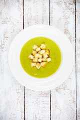 homemade cream soup with broccoli and croutons