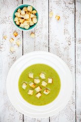 homemade cream soup with broccoli and croutons