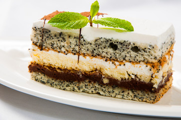 Cake with poppy seed and leaf fresh mint