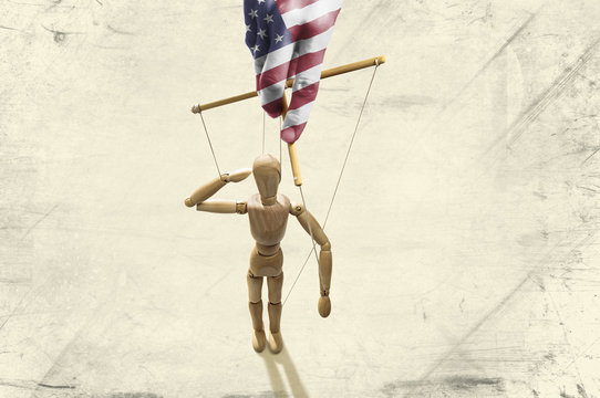 Hand Painted In The Colors Of The American Flag Manipulates Puppet On Paper Background