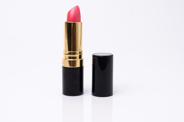 close up of a lipstick on white background