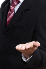 Businessman with outstretched open hand