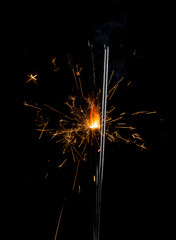 Framework from sparkling fireworks on a black background