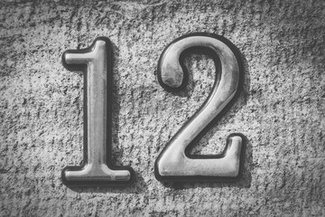 number '12'  stone background