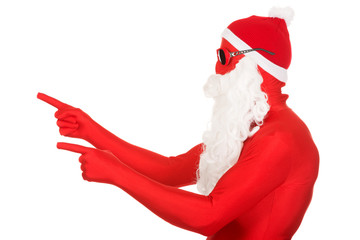 Portrait of santa man in latex clothing pointing