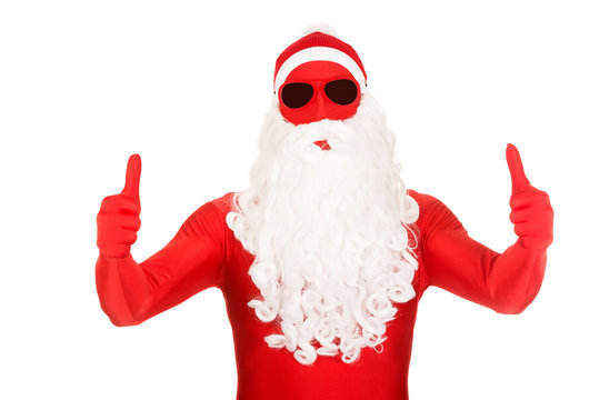 Portrait of santa in latex clothing with thumbs up
