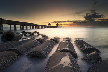Wat Jittapawan, Old bridge on sea in sunset at Pattaya, Thailand