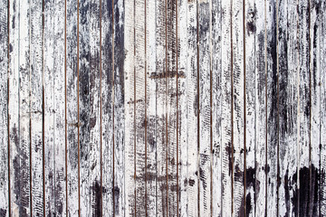Old rustic wooden plank wall painted white