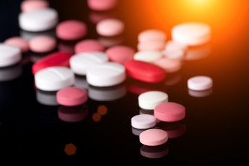 Colorful pills on pile