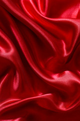 Fototapeta na wymiar Red silk or satin background 