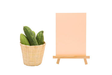 Long cucumber in small basket