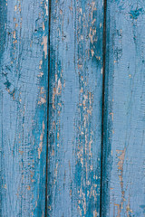 Fototapeta na wymiar Old Shabby Wooden Planks with cracked color blue paint