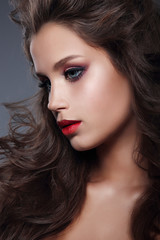 Fototapeta premium Beautiful girl model with professional makeup, profile.