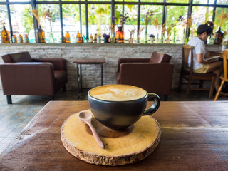 Cup of coffee on wood  table