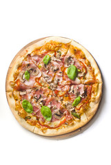 Pizza capricciosa with ham and mushrooms on white background